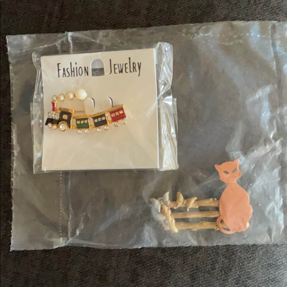 Set of pins. New in packages